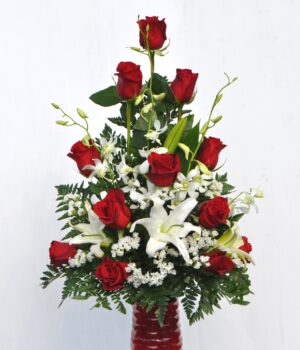 12 Assorted Roses, Delicate Lilies or Orchids.